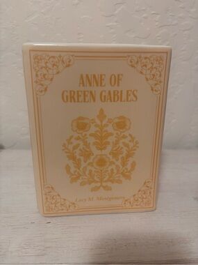 Anne of Green Gables book vase. ceramic book vase with vertical ribbed texture.